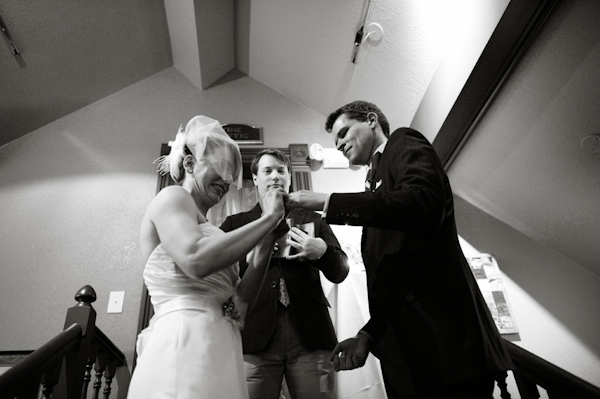 ring exchange - photo by Denver based wedding photographers Adam and Imthiaz